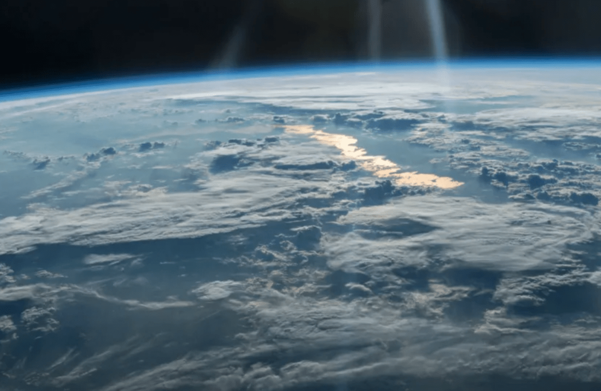 Researchers in China have found a way to transmit particles from the ground to a satellite orbiting more than 800 miles above the planet..png